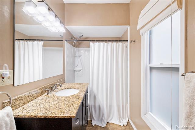 Builiding view nine for 209 Marquette St., Durand, MI. 48429