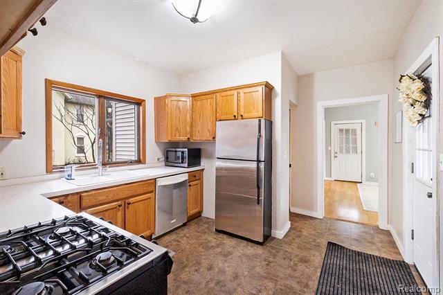 Builiding view seven for 209 Marquette St., Durand, MI. 48429