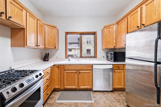 Builiding view six for 209 Marquette St., Durand, MI. 48429