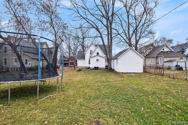 Builiding view sixteen for 209 Marquette St., Durand, MI. 48429