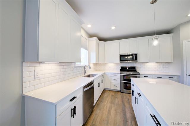 Builiding view nine for 3040 Bogues View Drive, Howell, MI. 48843