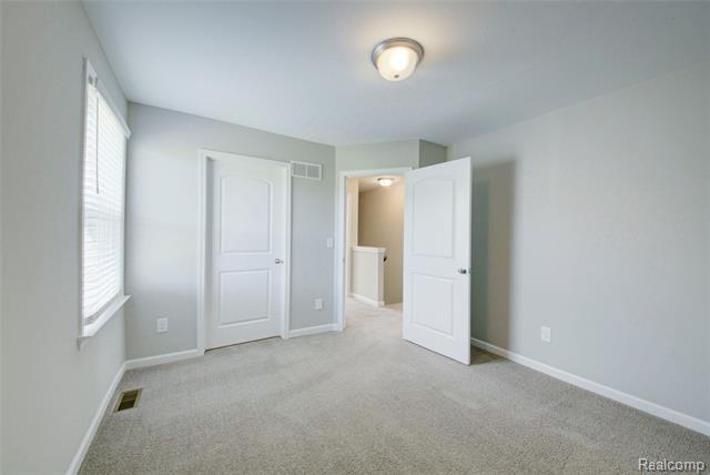 Builiding view sixteen for 3040 Bogues View Drive, Howell, MI. 48843