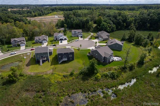 Builiding view thirty two for 3040 Bogues View Drive, Howell, MI. 48843