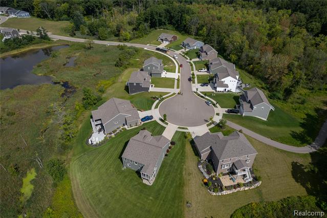 Builiding view thirty for 3040 Bogues View Drive, Howell, MI. 48843