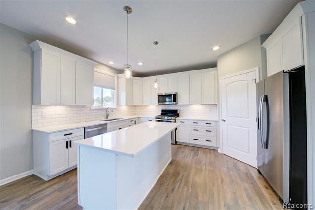 Builiding view twelve for 3040 Bogues View Drive, Howell, MI. 48843