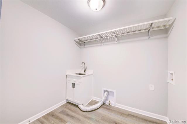 Builiding view twenty four for 3040 Bogues View Drive, Howell, MI. 48843