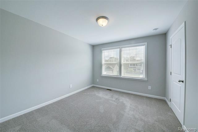 Builiding view twenty six for 3040 Bogues View Drive, Howell, MI. 48843