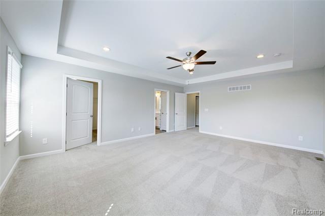 Builiding view twenty for 3040 Bogues View Drive, Howell, MI. 48843