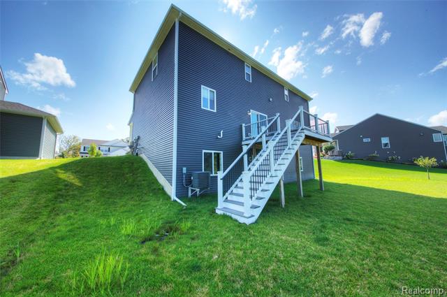 Builiding view two for 3040 Bogues View Drive, Howell, MI. 48843