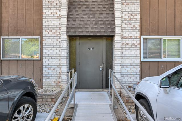 Builiding view seven for 7592 Woodview Dr. 4, Westland, MI. 48185