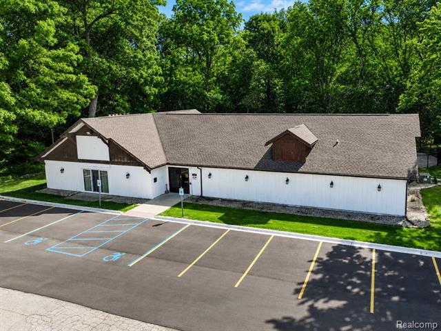 Builiding view twenty seven for 7592 Woodview Dr. 4, Westland, MI. 48185