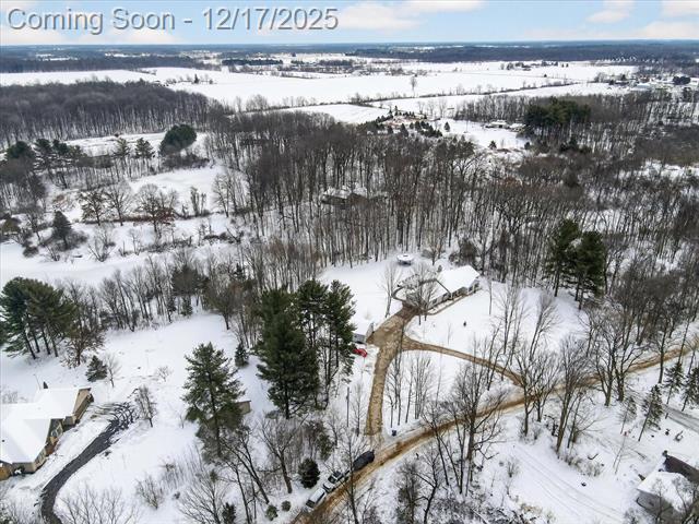 Builiding view sixty five for 1395 Lacey Lake, Charlotte, MI. 48813