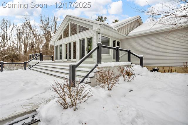 Builiding view sixty one for 1395 Lacey Lake, Charlotte, MI. 48813