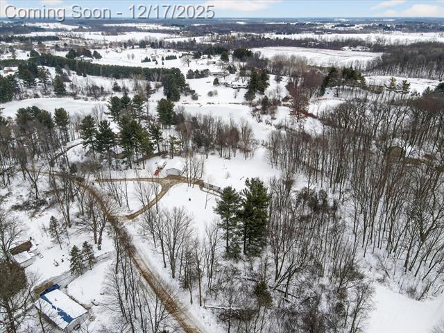 Builiding view sixty seven for 1395 Lacey Lake, Charlotte, MI. 48813