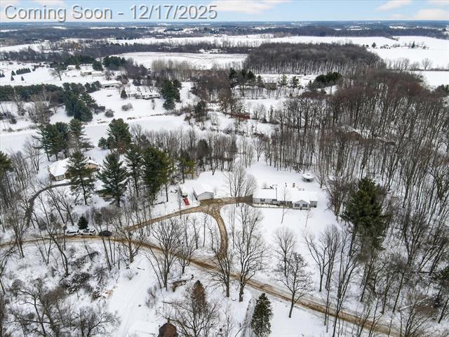 Builiding view sixty six for 1395 Lacey Lake, Charlotte, MI. 48813