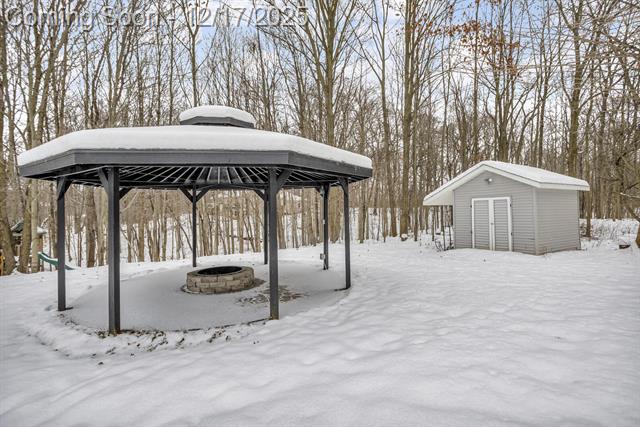 Builiding view sixty three for 1395 Lacey Lake, Charlotte, MI. 48813