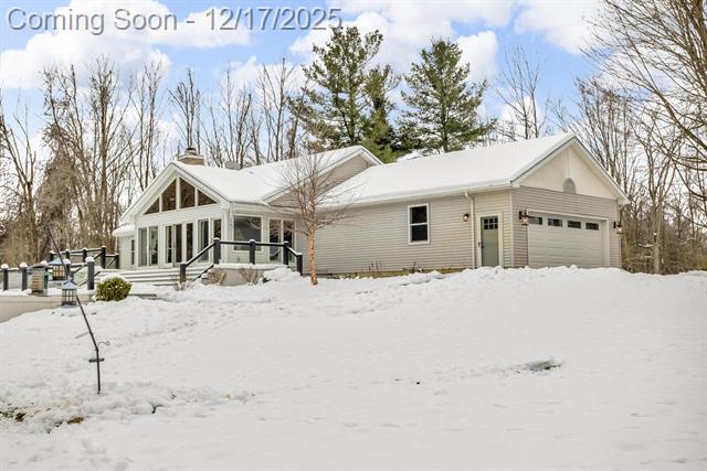 Builiding view sixty two for 1395 Lacey Lake, Charlotte, MI. 48813