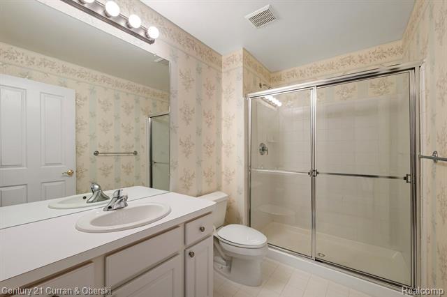 Builiding view thirty eight for 16925 Lochmoor Circle East, Northville, MI. 48168