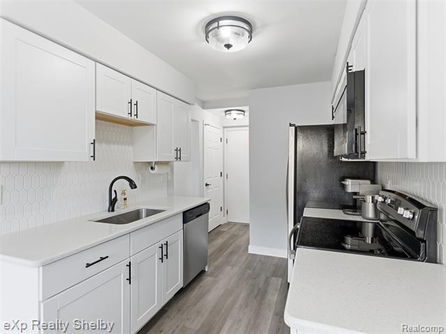 Builiding view eight for 44430 Virginia, Clinton Township, MI. 48038