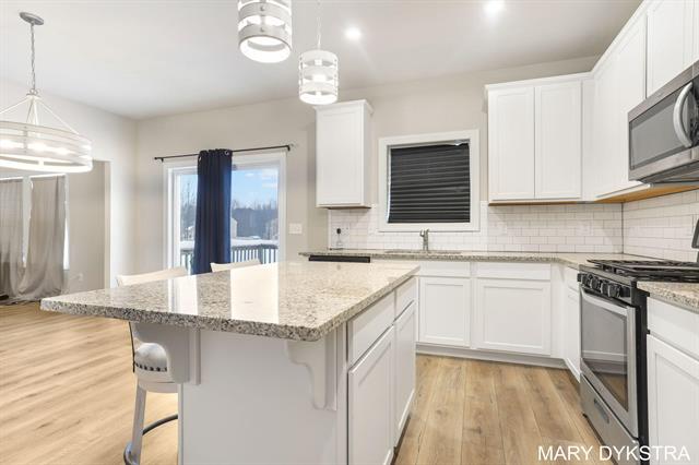 Builiding view twenty for 14579 Tupelo, West Olive, MI. 49460