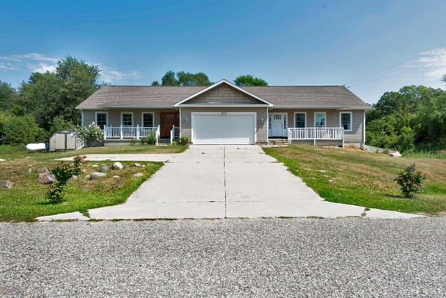 front view for 879 Flat Riverse Court, Lowell, Mi. 49331
