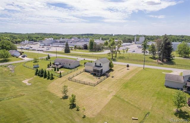 Builiding view twenty four for 3650 Sutton, Tecumseh, MI. 49286