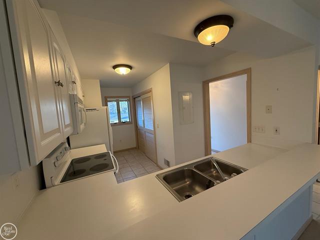 Builiding view twenty one for 5747 Main #24, Lexington, MI. 48450