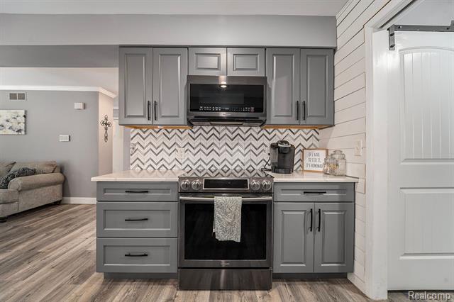 Builiding view nineteen for 3638 Deer Run, Brighton, MI. 48114