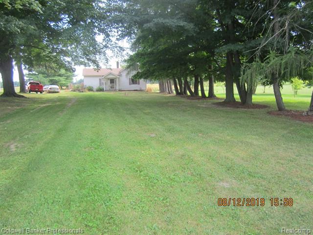 front view for 2152 E Ohmer Road, Mayville, Mi. 48744