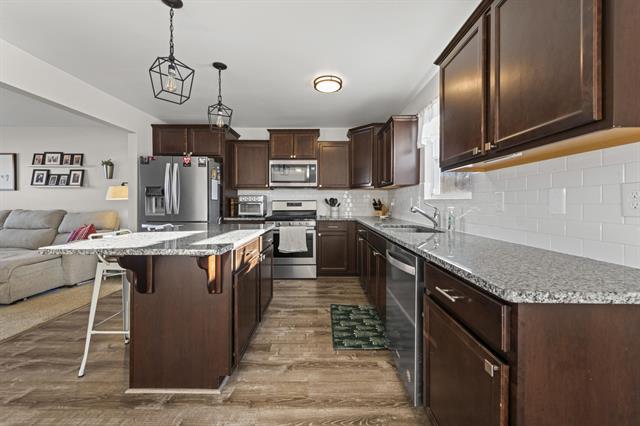 Builiding view four for 1073 Weatherstone Lane, Howell, MI. 48843