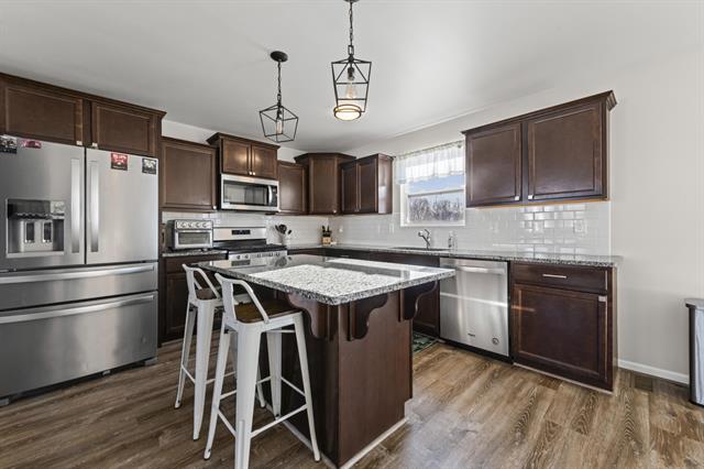 Builiding view three for 1073 Weatherstone Lane, Howell, MI. 48843