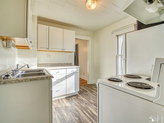 Builiding view six for 705 13Th, Monroe, MI. 48161