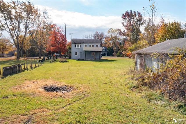 Builiding view eleven for 208 Erie, Temperance, MI. 48182