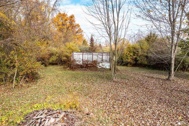 Builiding view five for 208 Erie, Temperance, MI. 48182