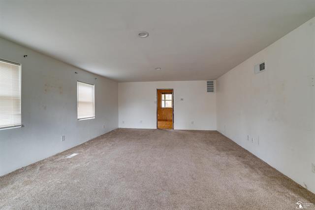 Builiding view thirty for 208 Erie, Temperance, MI. 48182