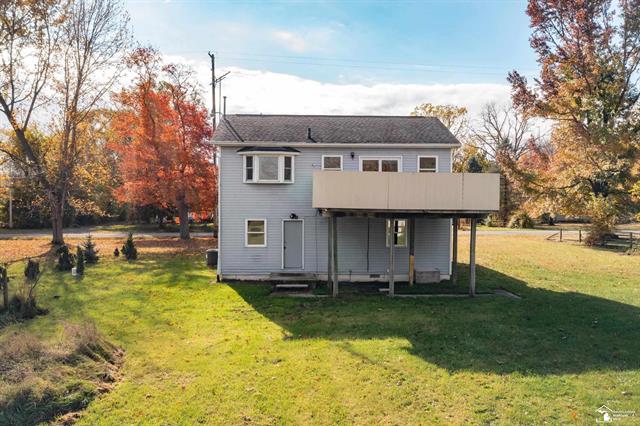 Builiding view twelve for 208 Erie, Temperance, MI. 48182