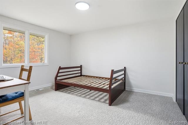 Builiding view twenty eight for 23460 Coventry Woods, Southfield, MI. 48034