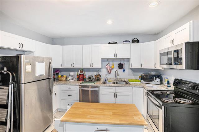 Builiding view ten for 205 Moores River, Lansing, MI. 48910