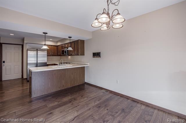 Builiding view eleven for 37660 Laurel Park, Livonia, MI. 48152