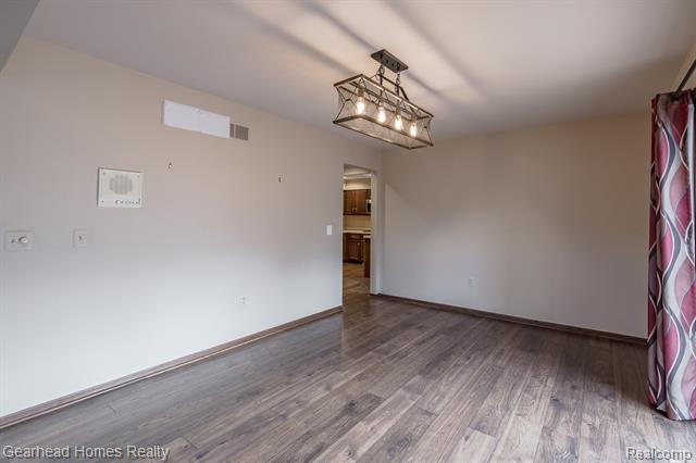 Builiding view ten for 37660 Laurel Park, Livonia, MI. 48152