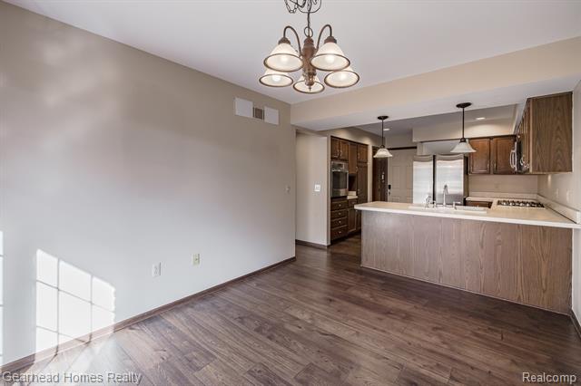 Builiding view twelve for 37660 Laurel Park, Livonia, MI. 48152