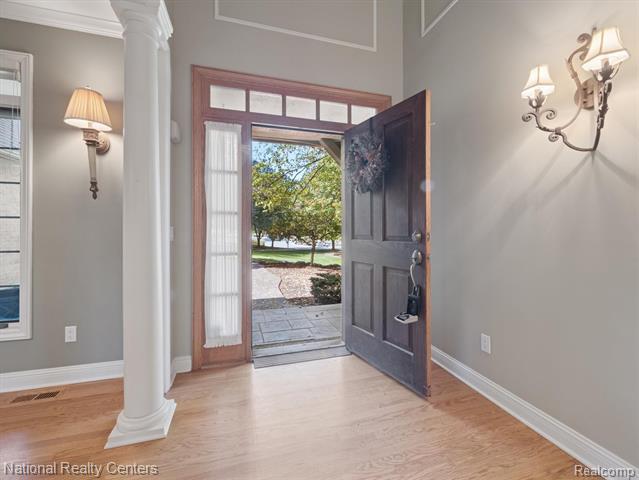 Builiding view eight for 1569 Gleneagles, Highland, MI. 48357