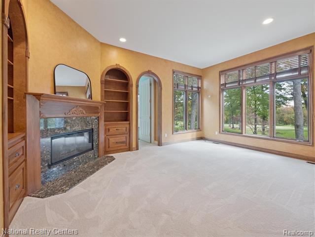 Builiding view eleven for 1569 Gleneagles, Highland, MI. 48357