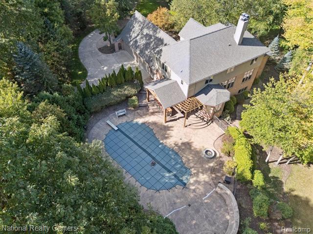 Builiding view five for 1569 Gleneagles, Highland, MI. 48357