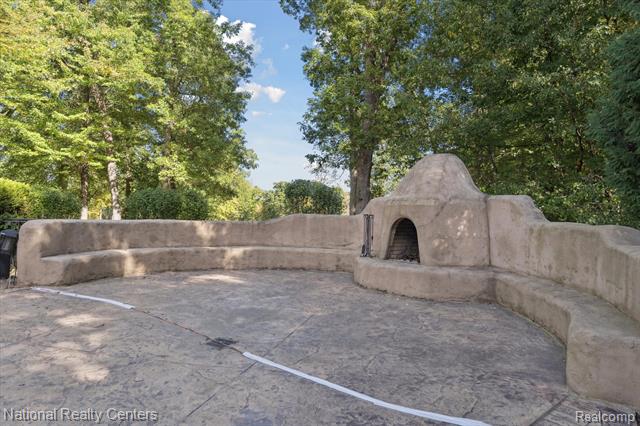 Builiding view forty for 1569 Gleneagles, Highland, MI. 48357