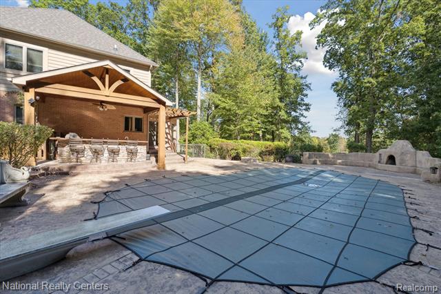 Builiding view seven for 1569 Gleneagles, Highland, MI. 48357