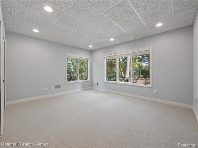 Builiding view thirty seven for 1569 Gleneagles, Highland, MI. 48357