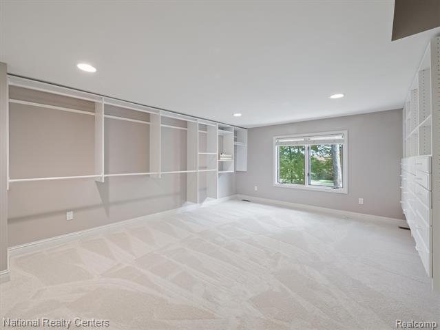 Builiding view thirty for 1569 Gleneagles, Highland, MI. 48357