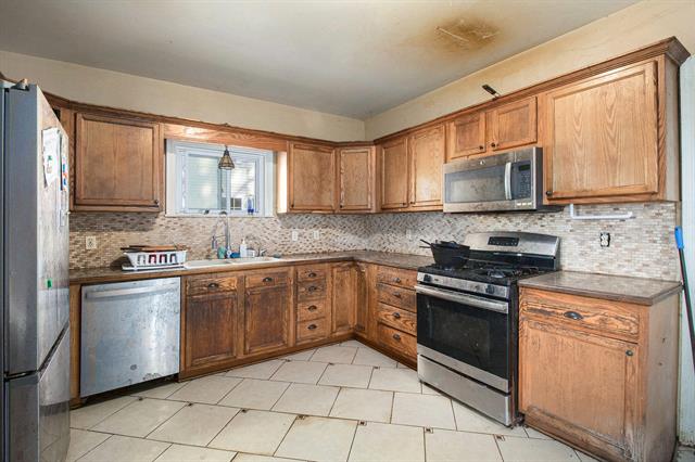 Builiding view ten for 4229 Mill, North Branch, MI. 48461