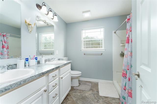 Builiding view twenty three for 7047 Bennington Greens, Owosso, MI. 48867